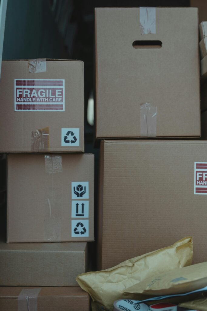Cardboard boxes with fragile labels ready for shipping and storage solutions.